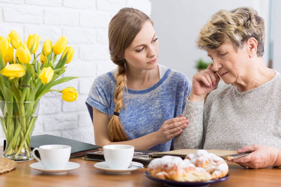 Teen Women and Older Women with coffee in the Table