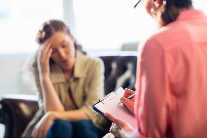 Psychologist having session with her patient