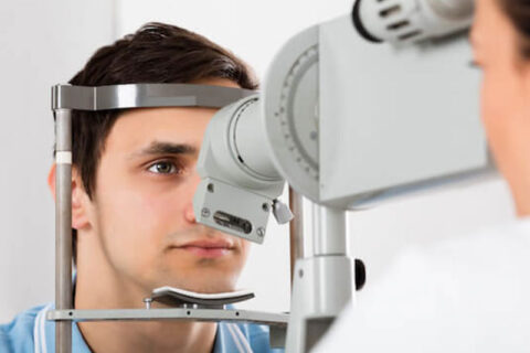 A person getting his eyes check