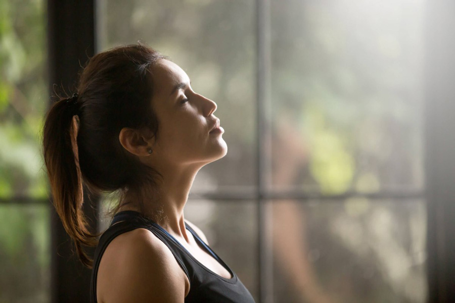 young women meditating