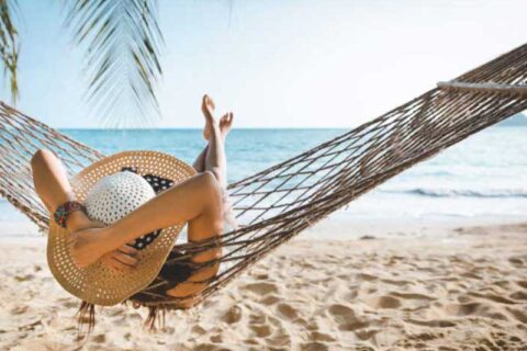 a woman relaxing on beach