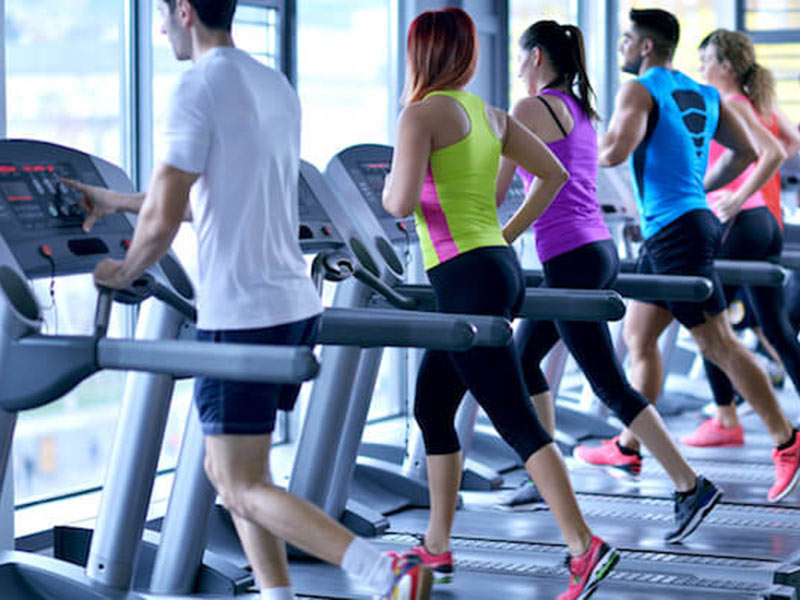 people running on treadmill in gym