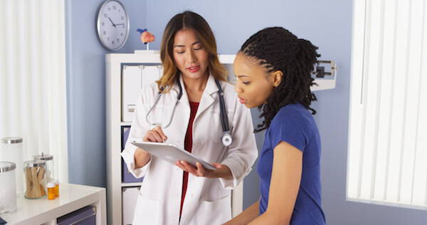 A Doctor Explaining something to a patient