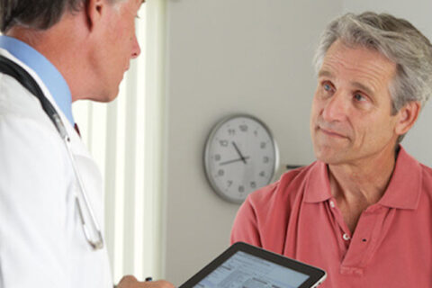 doctor talking with patient