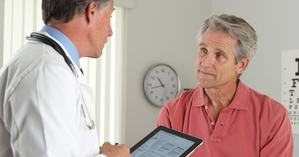 doctor talking with patient