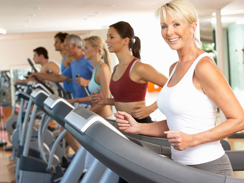 people running on treadmill in gym