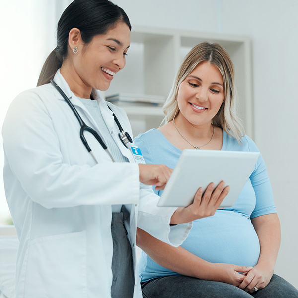 Shot of a doctor during a consultation with a pregnant patient in a clinic