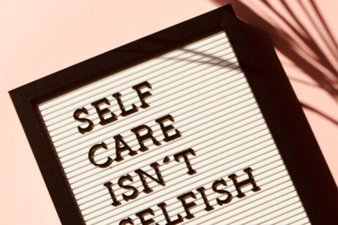 Self care is not selfish written in a board