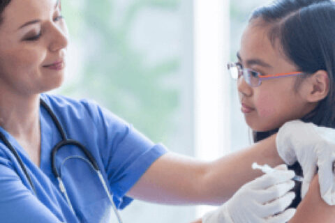 The Doctor given injection to a girl