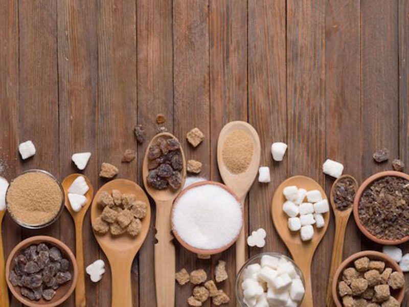 sugar cubes in spoons