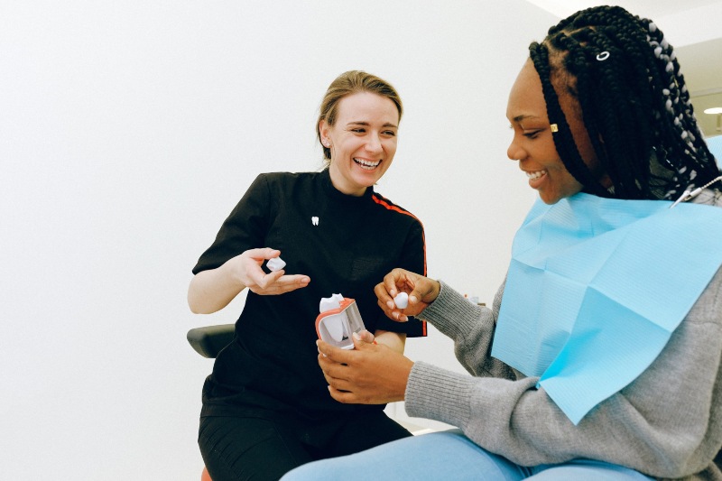 doctor treating her patient