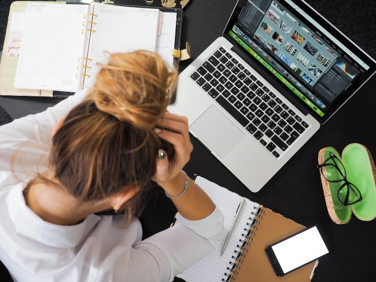 women stressing out while working