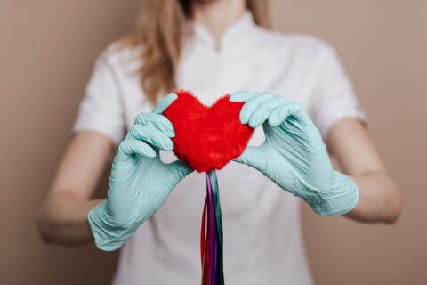 Nurse with toy heart in her hand, Melbourne FL