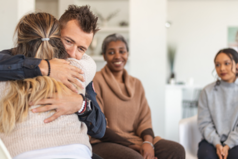 patients hugging each others