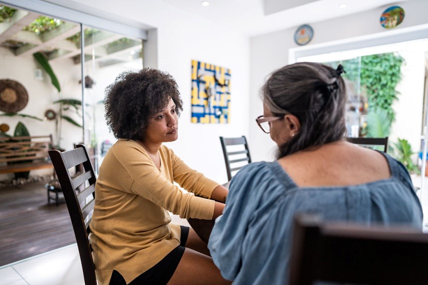 A Women counselling other woman