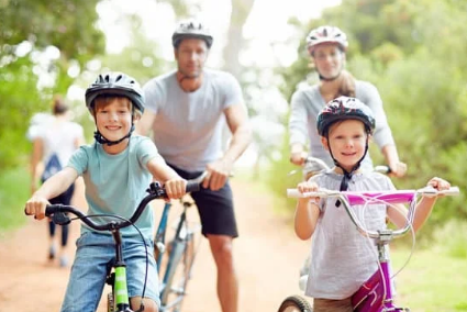 Family riding bikes