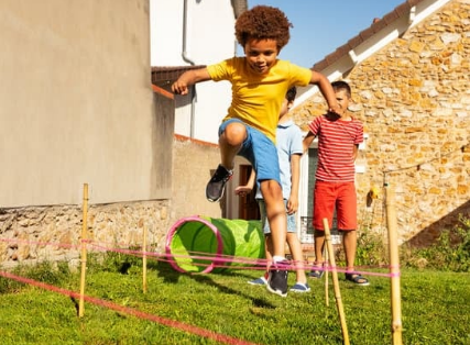 Kids playing on obstacle course at hom