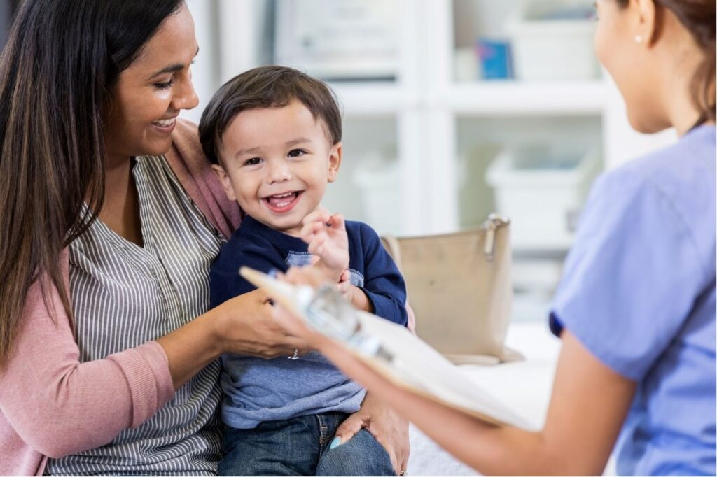 Young child and mother in pediatrician's office