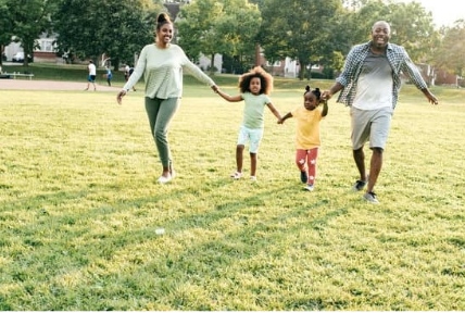 Family enjoys evening walk in Brevard County park, joining local Evening Walk Challenge
