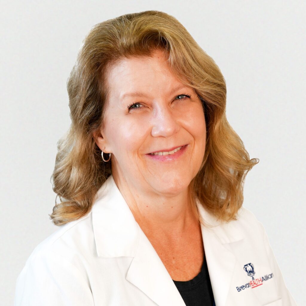 Medical expert Wendy Lockhart, MD in professional attire at Brevard Health Alliance
