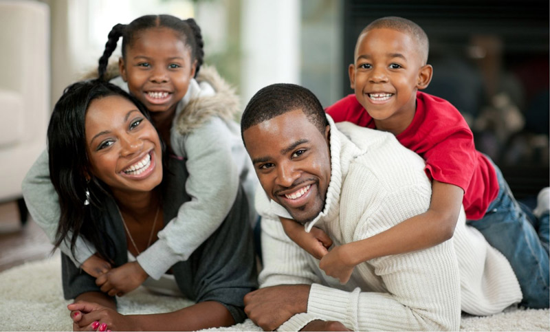 Family smiling together.
