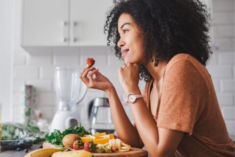 Woman eating a meal at home