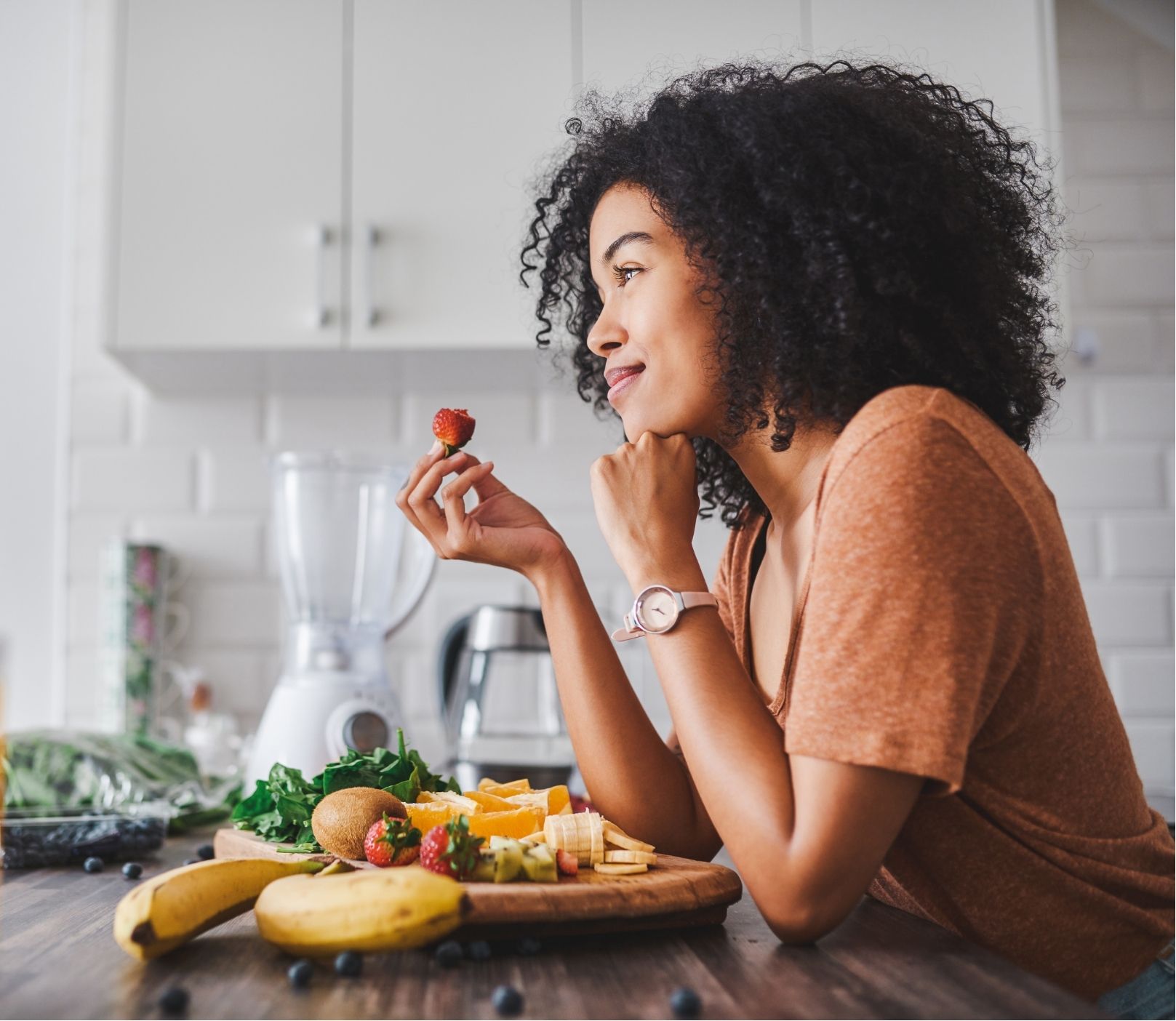 Woman eating a meal at home
